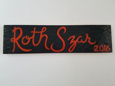 Custom designed and hand carved family plaque in basswood.  Painted and varnished