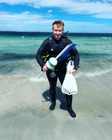 A person standing at sea