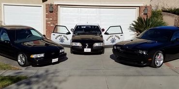 Vehicle collection: 1996 Chevrolet Impala, 2008 Dodge Challenger, 1991 CHP SSP Mustang