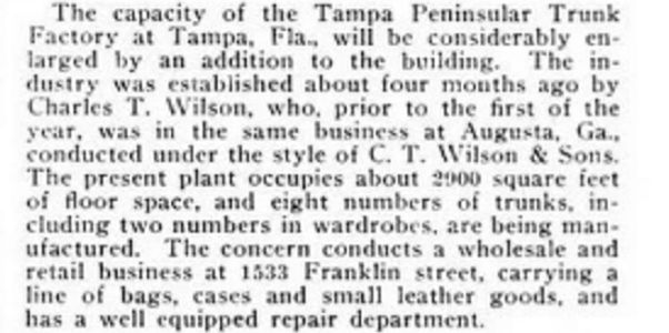 Vintage newspaper page on trunks, leather goods, and umbrellas with industry news and obituaries.