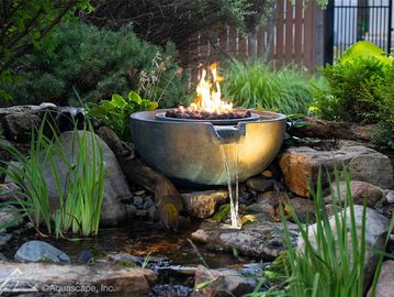 Fire & Water Spillway Bowl with running water and fire burning installed with plants