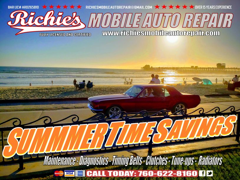 Classic red car parked by the beach at sunset with a summer savings banner.