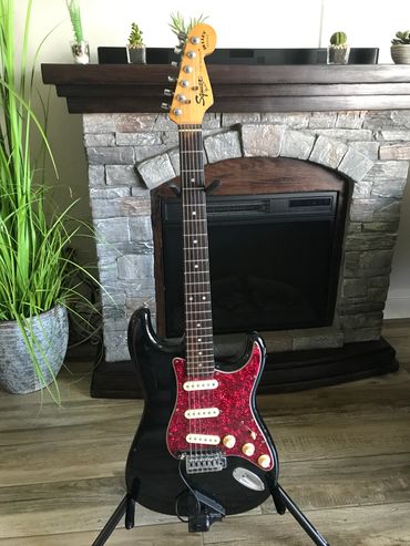 Black Older Fender Squirer Bullet Series Stratocaster with Roland GK-2A Midi Pickup. $400