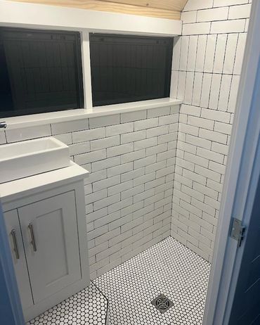 Tile shower in a bus