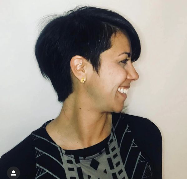 Short textured haircut with point cutting techniques.