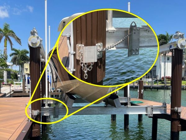 Boat lift lock mechanism securing the boat in place at the dock.