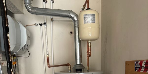 Plumbing we ran for water heater and expansion tank.