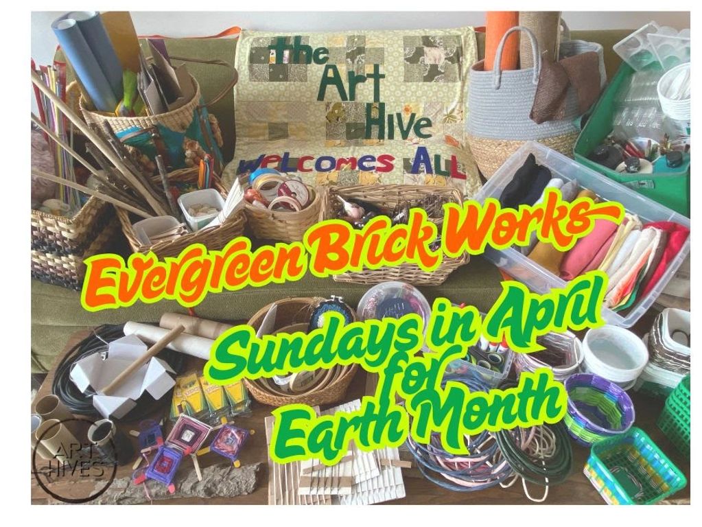 A collection of crafting and art making materials including recyclables surrounding a quilted blanke