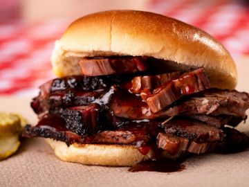 El Jefe sandwich. Brisket, pork, sausage and ribs between 2 buns.