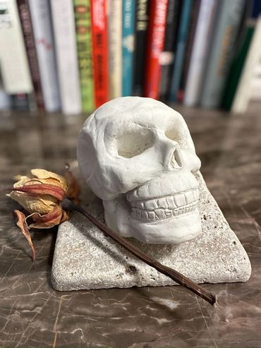 White clay skull sculpture