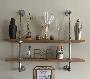 custom cedar and galvanized pipe shelving unit