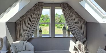 Show House Bespoke Twin pleated curtains fitted into Apex area.