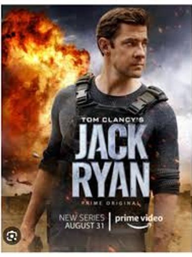 Photo of Jack Ryan with fire in the background.
