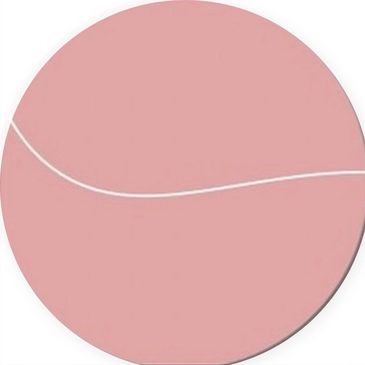 Close-up of a pink tennis ball with a white curved seam.