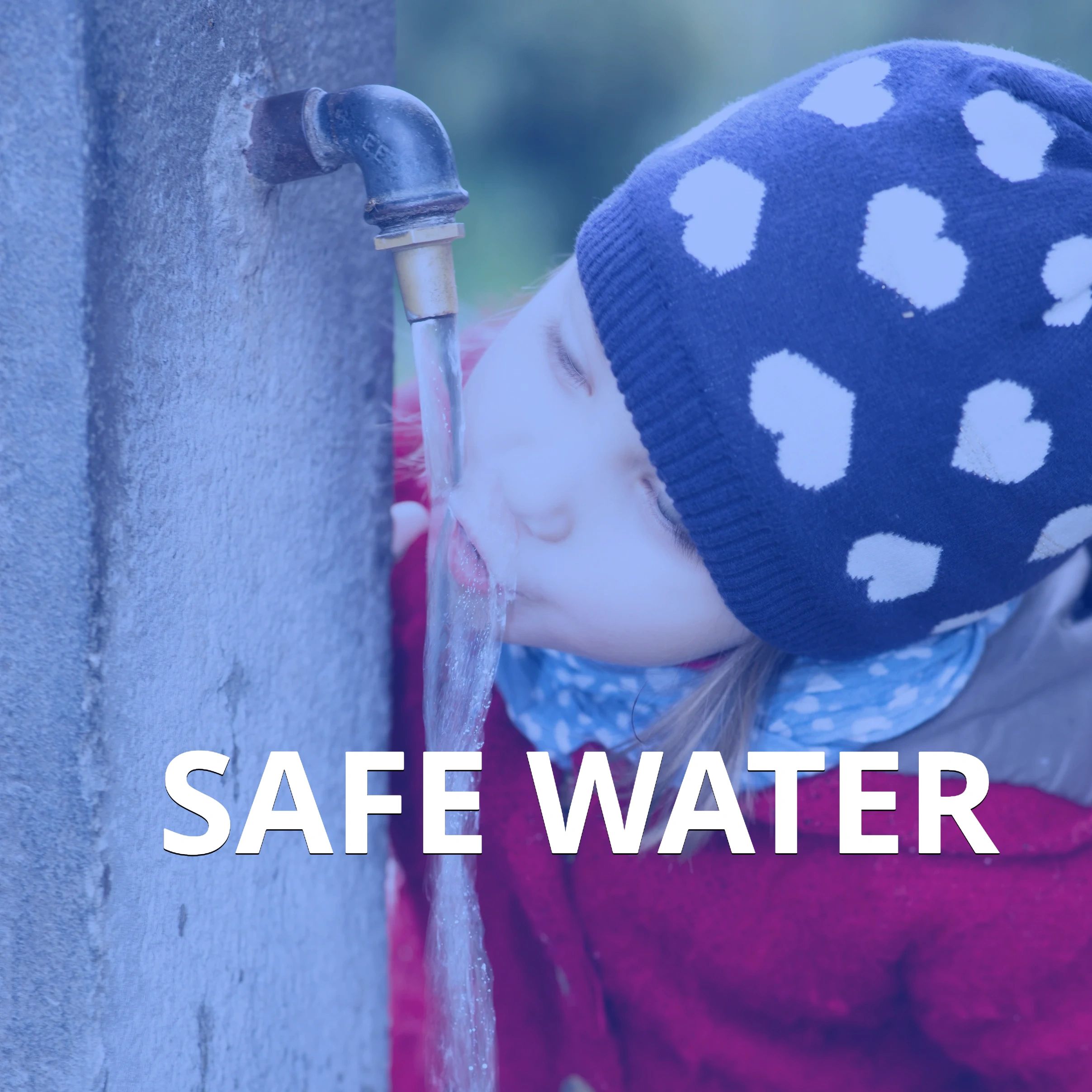 Child drinking clean water from a public tap, emphasizing safe water access.