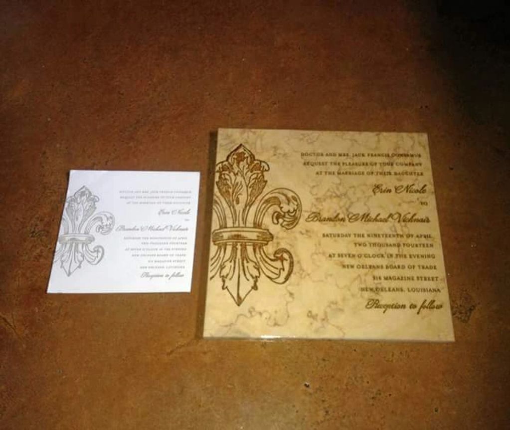 Take a wedding invitation and embed it into stone to make a great wedding gift