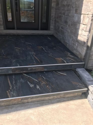 Custom tiled exterior entrance stairs