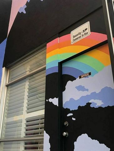 Artist Mara Bubblegum acrylic wall mural in Gardena, Ca. for PrintOnTees by SCOPEINC.