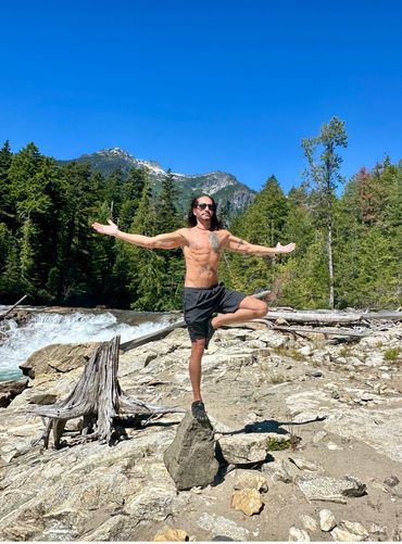 Jared Ruban  od Body Plus LLC Trying Tree Pose,
