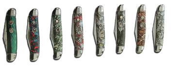 Eight variations of Utility Jack switchblade knives with rare handle colors.