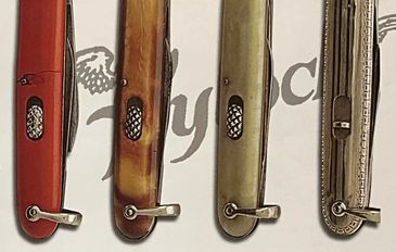 four antique american flylock switchblade knives.