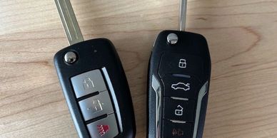A set of two keys with remote fob programming.