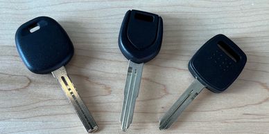 A set of three transponder chip keys.