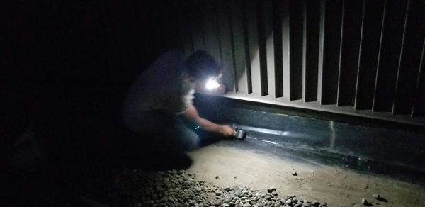 Middle of the night fixing a roof so a client can sleep soundly knowing his business is protected.