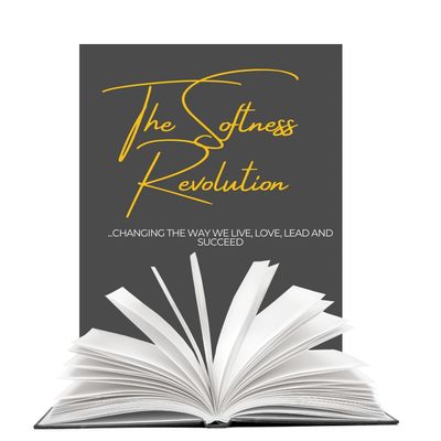 Open book with the title 'The Softness Revolution' and subtitle on a dark background.