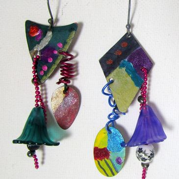 Handpainted charms, bead chain, wire, layered collages of rainbow colors, kinetic and sculptural
$47