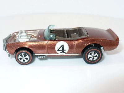 Toy classic muscle car with number 4 decal.