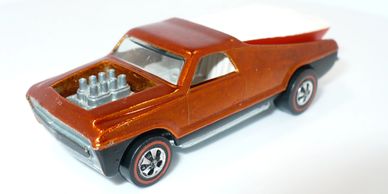 Toy car resembling a vintage pickup with exposed engine.