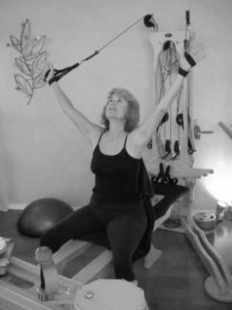 Marylou enjoying Gyrotonic upper body opening
