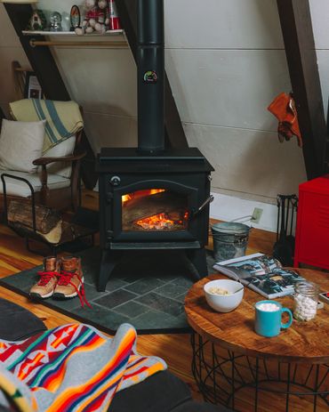 Woodstove inside Vermont Chalet A-frame cabin in Jamaica Vermont
