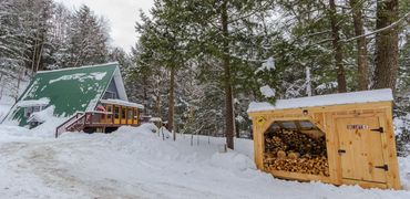 A-frame cabin with woodshed at Vermont Chalet in Vermont