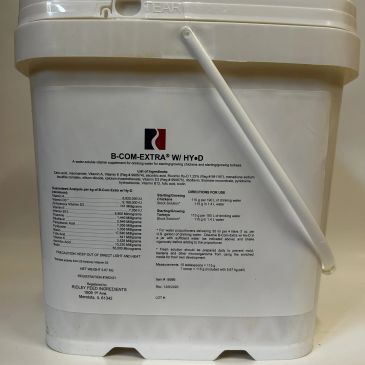 White container labeled B-COM-EXTRA® W Hy-D with nutritional information.