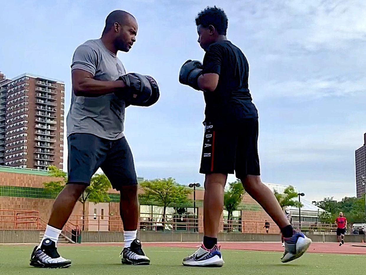 Private Youth Boxing Coach Ralph Gilmore teaching boxing lessons to kids & teens in Manhattan, NYC.