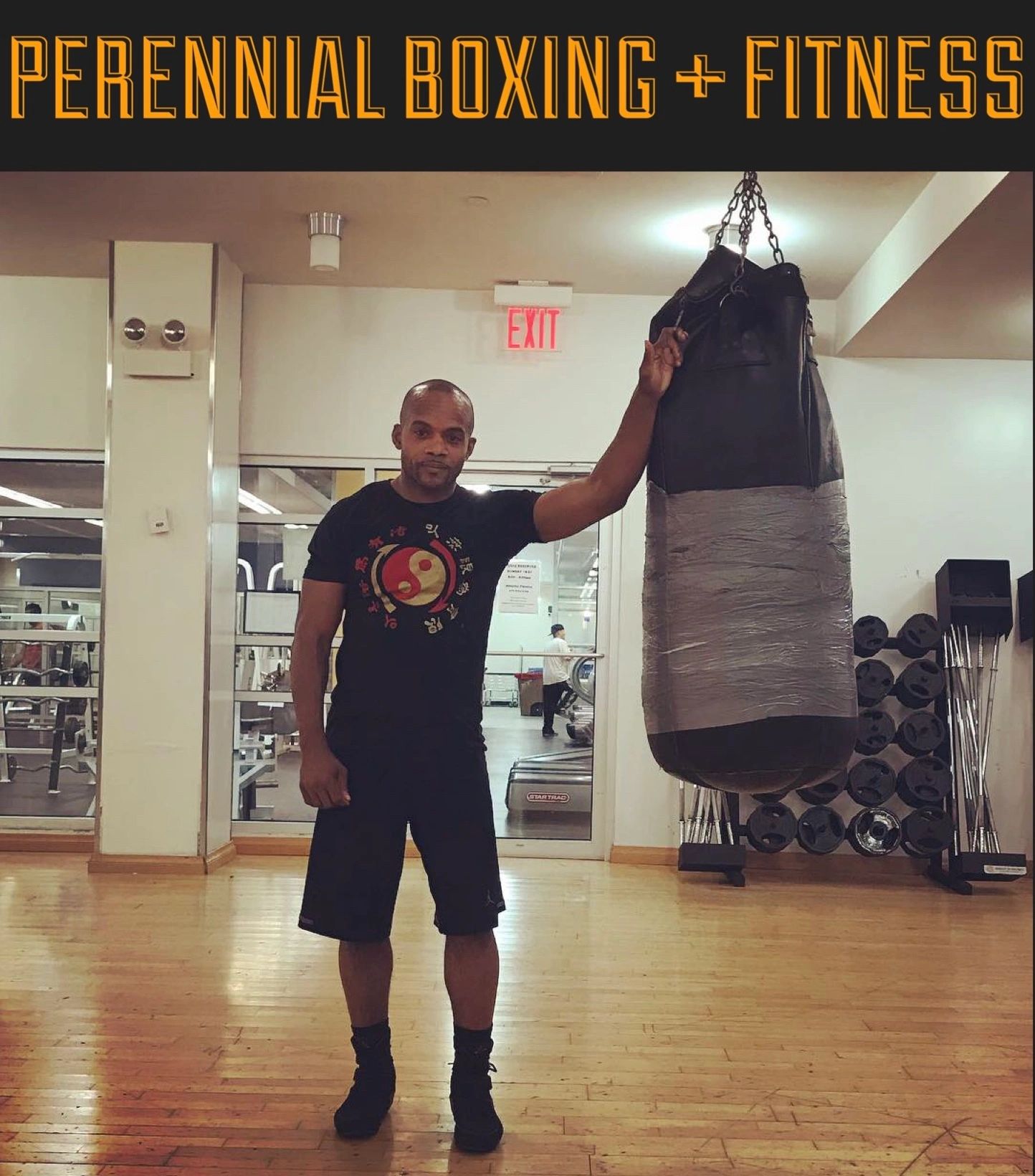 Perennial Boxing + Fitness Coach Trainer Ralph Gilmore prepares private training workout at NYC gym.