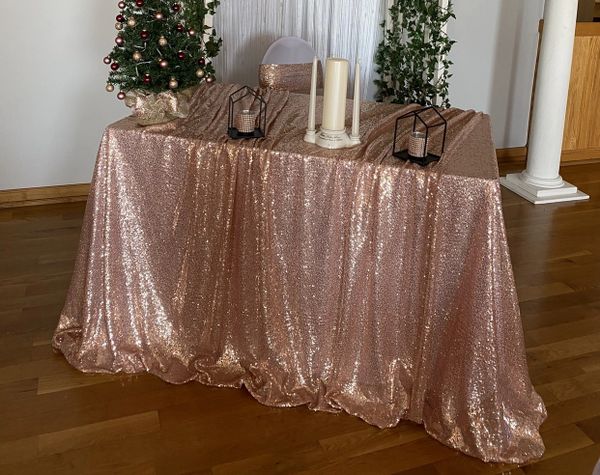 Sequin rectangle tablecloths. Made to lay flat on an 8 foot rectangle table, or, scrunched on a smal