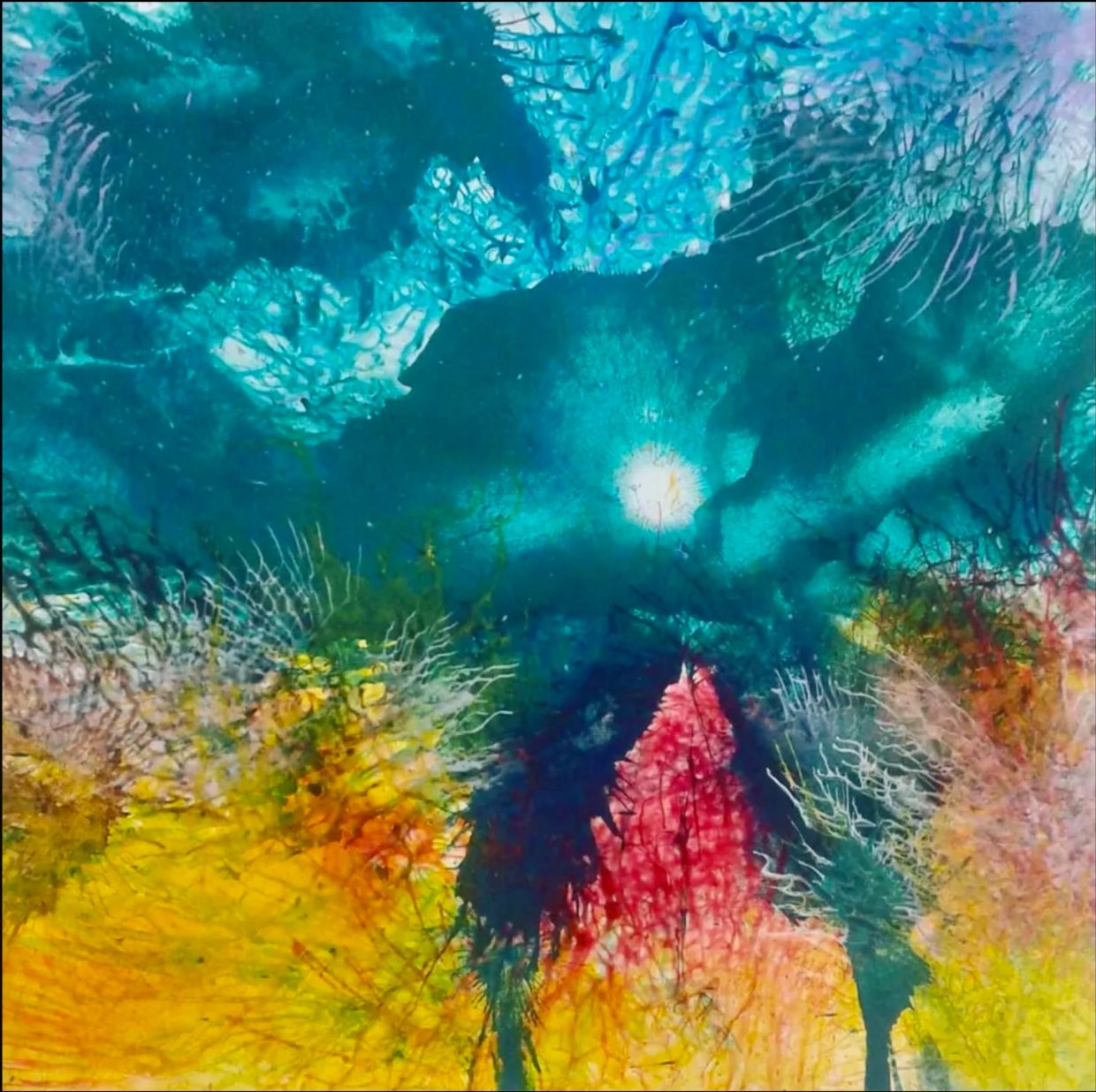 Colorful abstract painting with blue, yellow, and red tones.