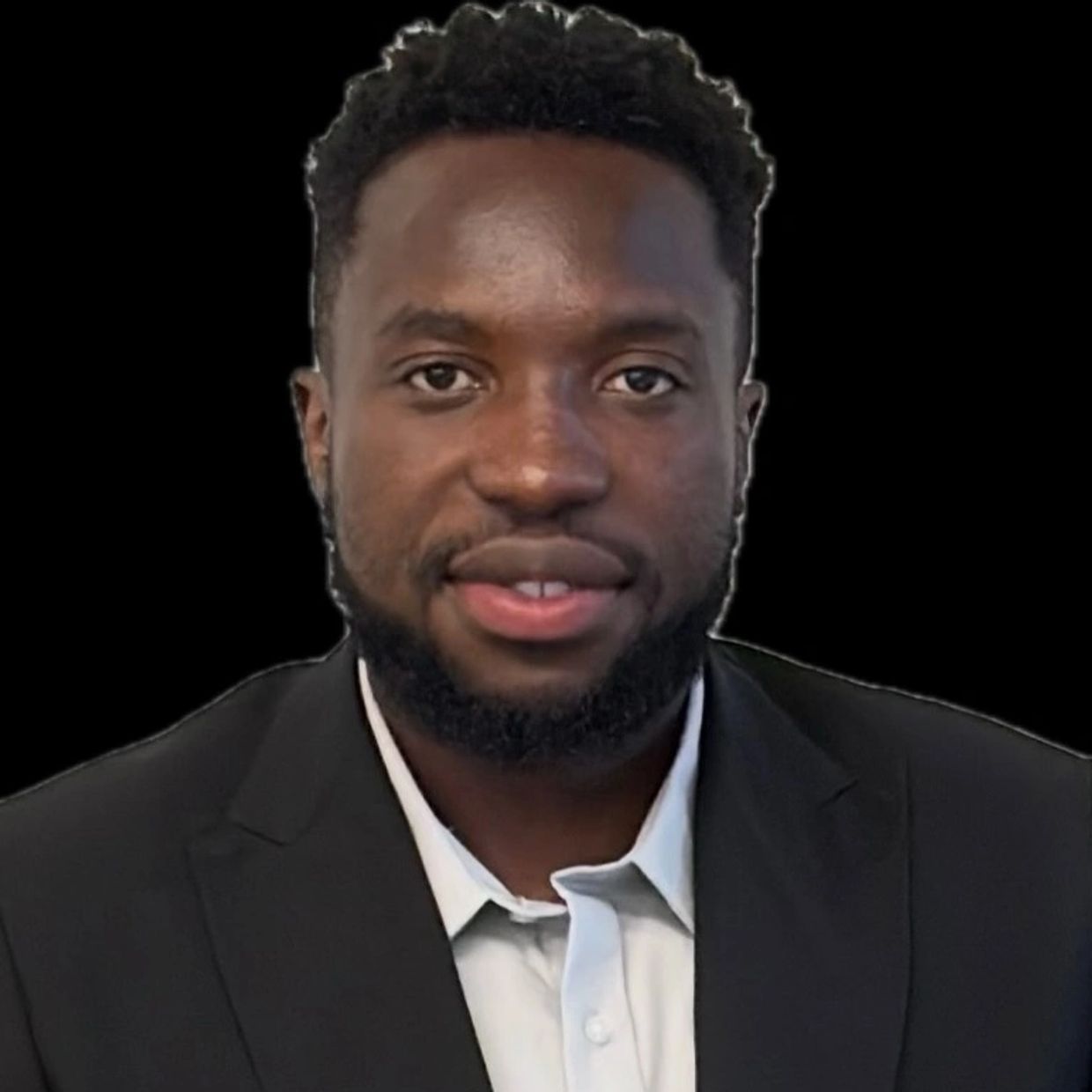 Man in formal black suit with white shirt.