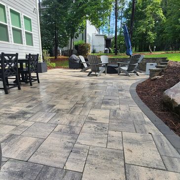 Patio with chairs and outdoor seating area.