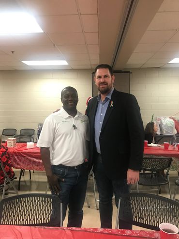 Democratic Party Chairman Wes Hodge and Candidate Eric McIntyre at Charity event for those in need.