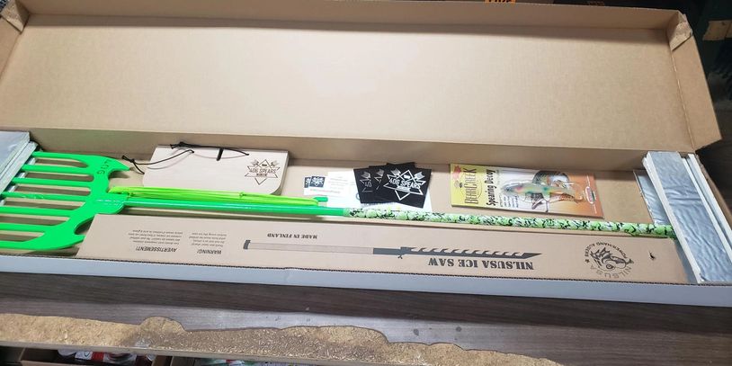 Neon Green 7 Tine Ice Fishing Spear, Sheath, Ice Saw, and Spearing decoy ready to ship out.