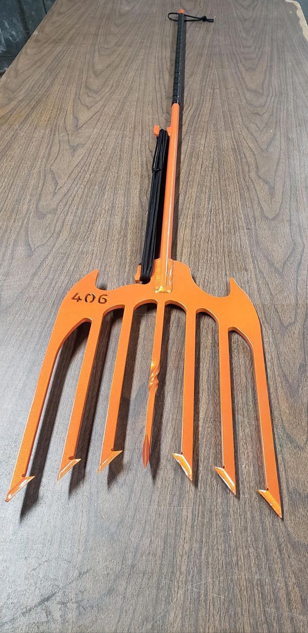 Orange 7 Tine Ice Fishing Spear ready to ship out to a customer in North Dakota.