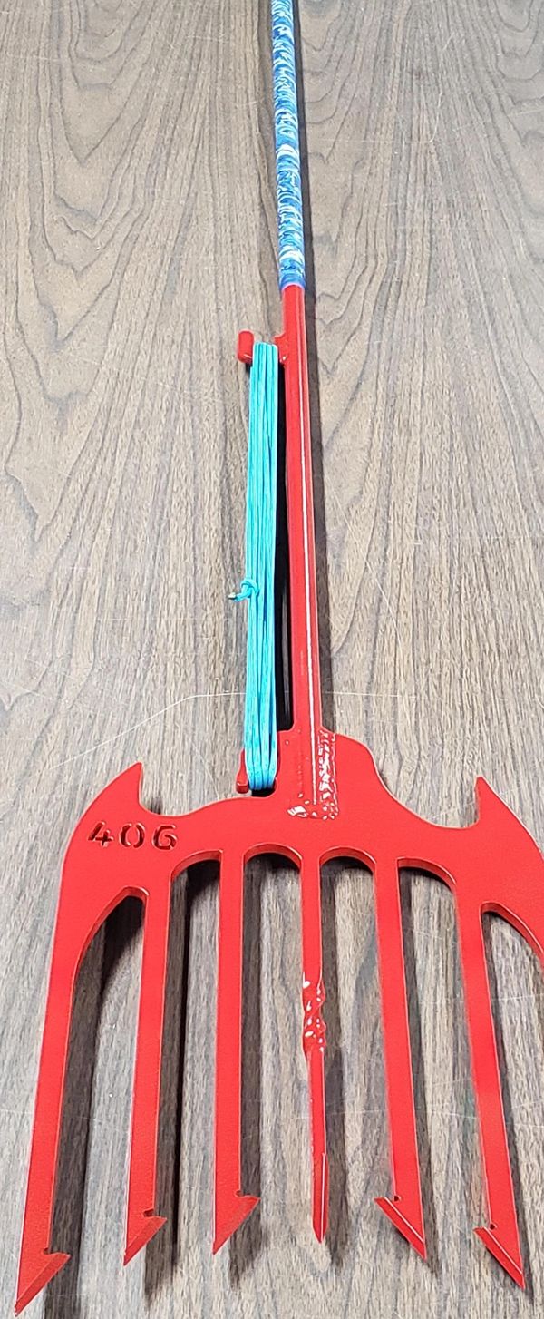 Red & Blue 7 Tine Ice Fishing Spear picked as the Free Spear Giveaway.