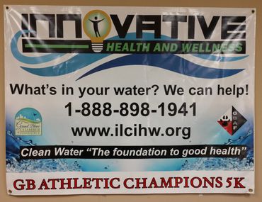 Sign for the GB Athletic Champions 5k with information on our clean water initiative