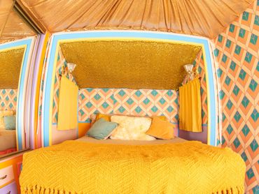 Fully custom renovated RV for a California desert resort. Themed and colored to match the sunrises.