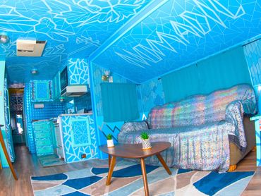 Fully custom renovated RV for a California desert resort. Themed and colored to match an afternoon