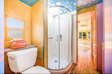 Fully custom renovated RV for a California desert resort. Themed and colored to match the sunrises.